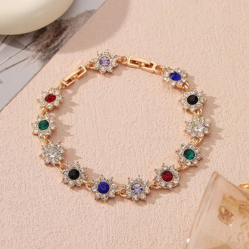 Flower charm bracelet in zinc alloy with electroplated finish and colourful crystal accents