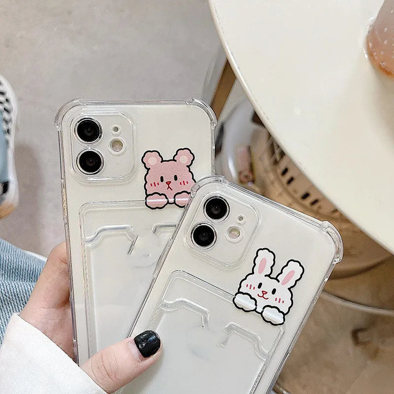 Transparent TPU phone case with cartoon paint design and card holder slot fitted on Apple iPhone