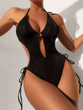 Women's black lace up triangle bikini swimsuit with solid colour polyester fabric