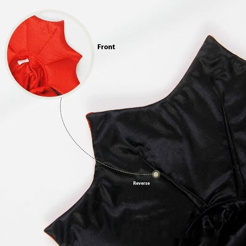 Black and red Halloween costume for a cat or dog on a hanger.