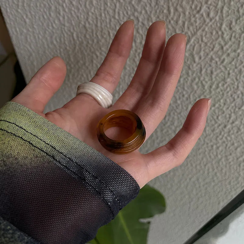Chinese style irregular geometric resin ring with wide band design in Maillard brown colour