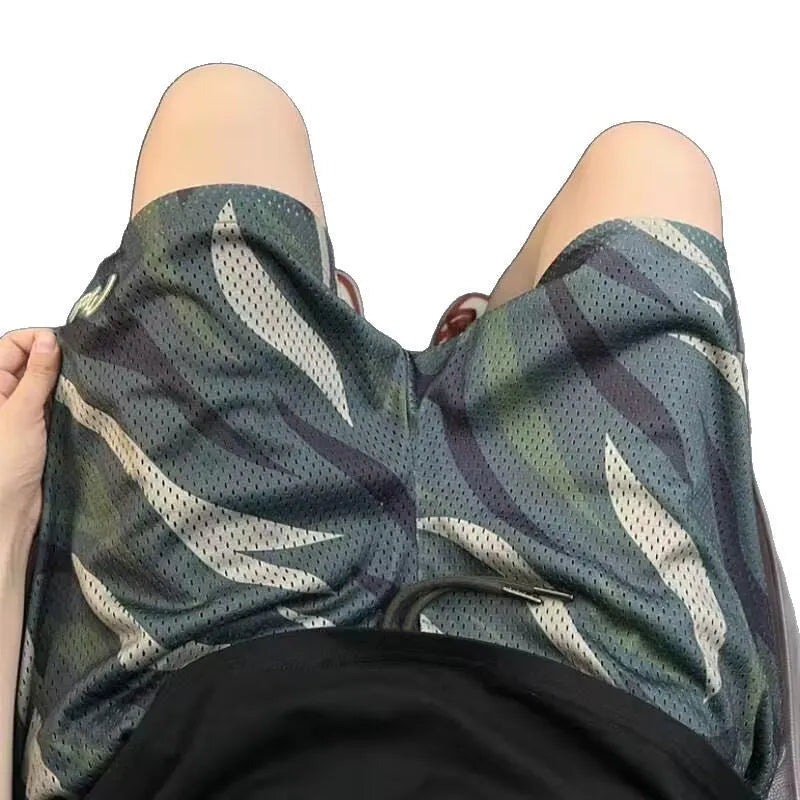 Men's camouflage mesh shorts with straight fit cut in cotton blend polyester fabric