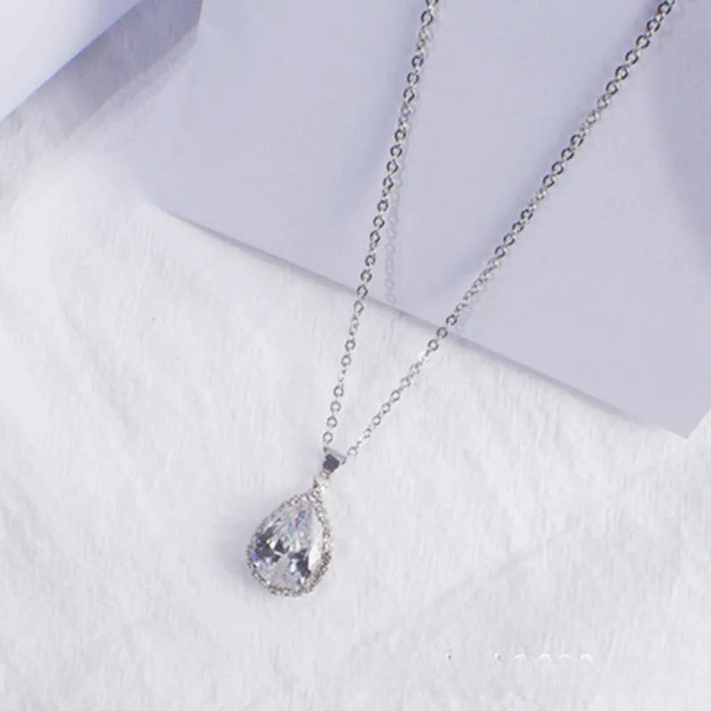 Drop shape women's necklace with rose gold electroplating and rhinestone geometric design in pink colour
