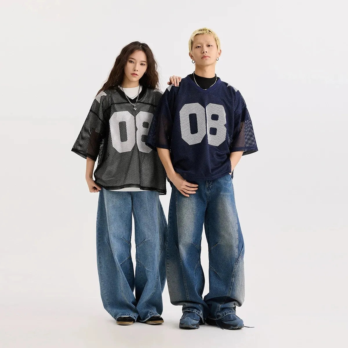 Loose fit half sleeve pullover shirt with letter print pattern in black or navy blue.