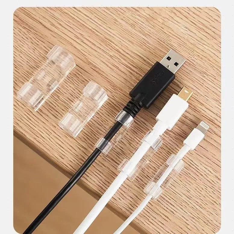 Transparent self-adhesive plastic cable clips in four different sizes for wire management.