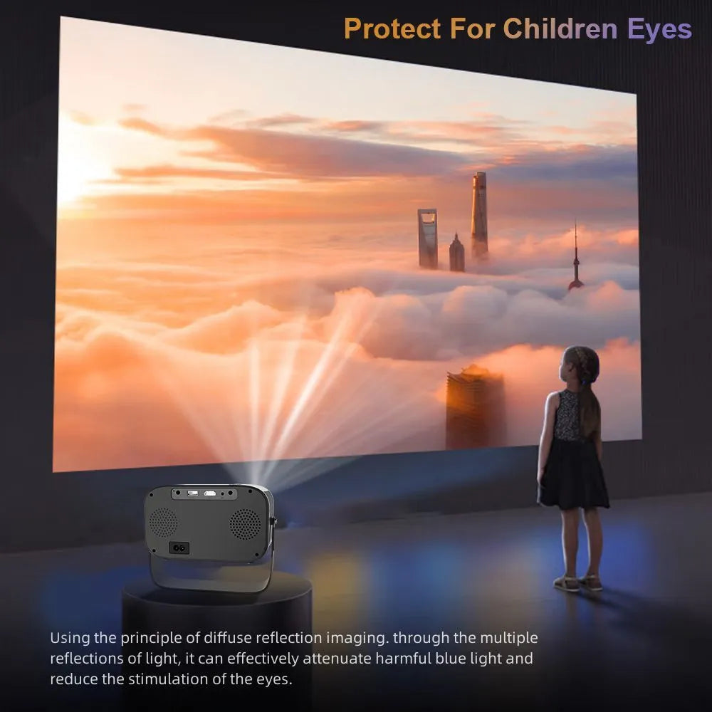 Black portable HD projector with Android interface and remote control on desk