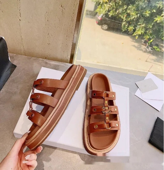 Women's Roman style sandal slippers in sheepskin with patent leather finish, showing colour options