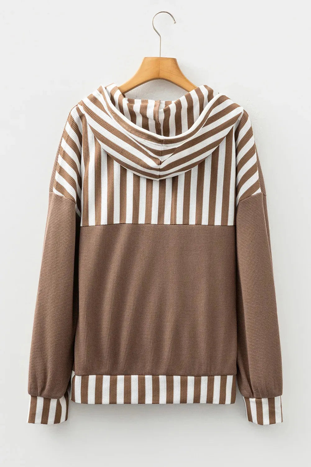 Straw yellow waffle texture hoodie with striped patchwork design, button neck, and drawstring hood.