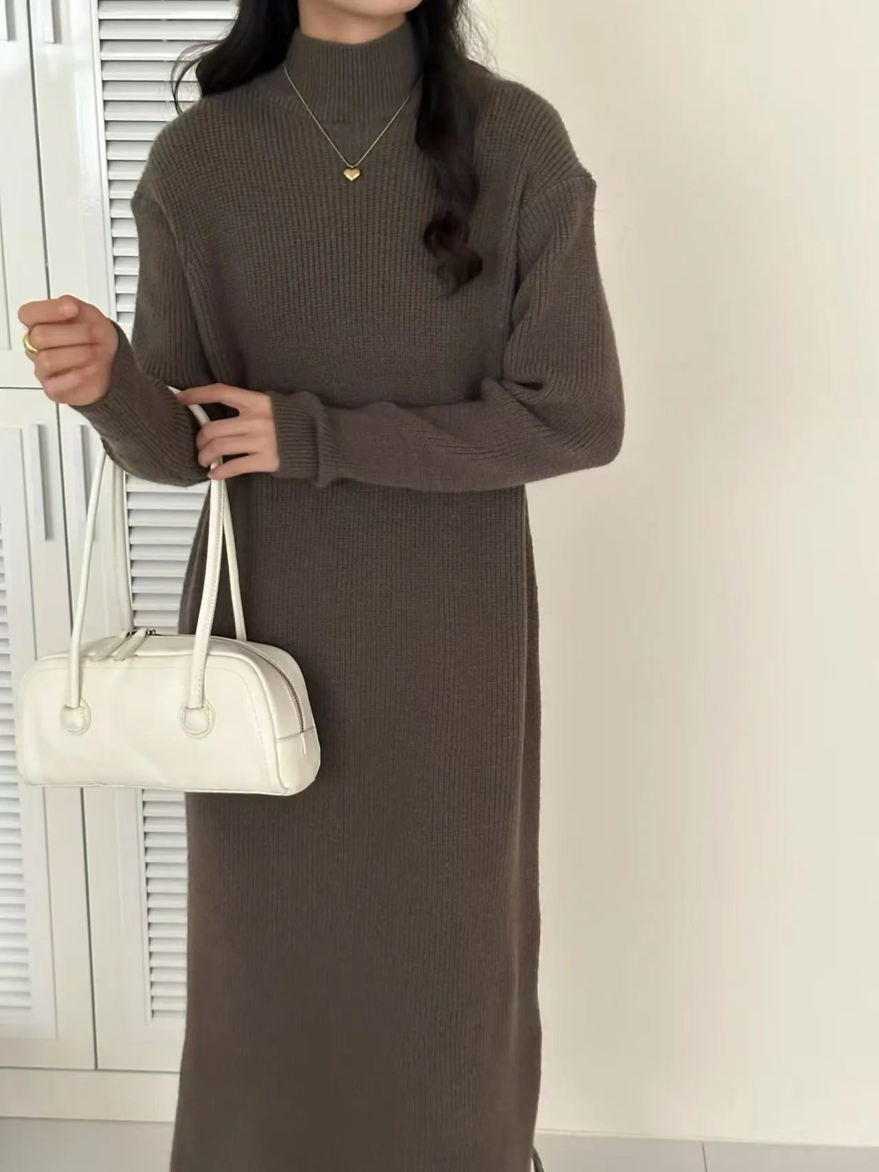 Half turtleneck acrylic knitted dress in midi length with long sleeves and high waist