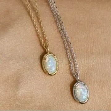 Jelly opal gemstone set in a geometric oval sterling silver pendant necklace.