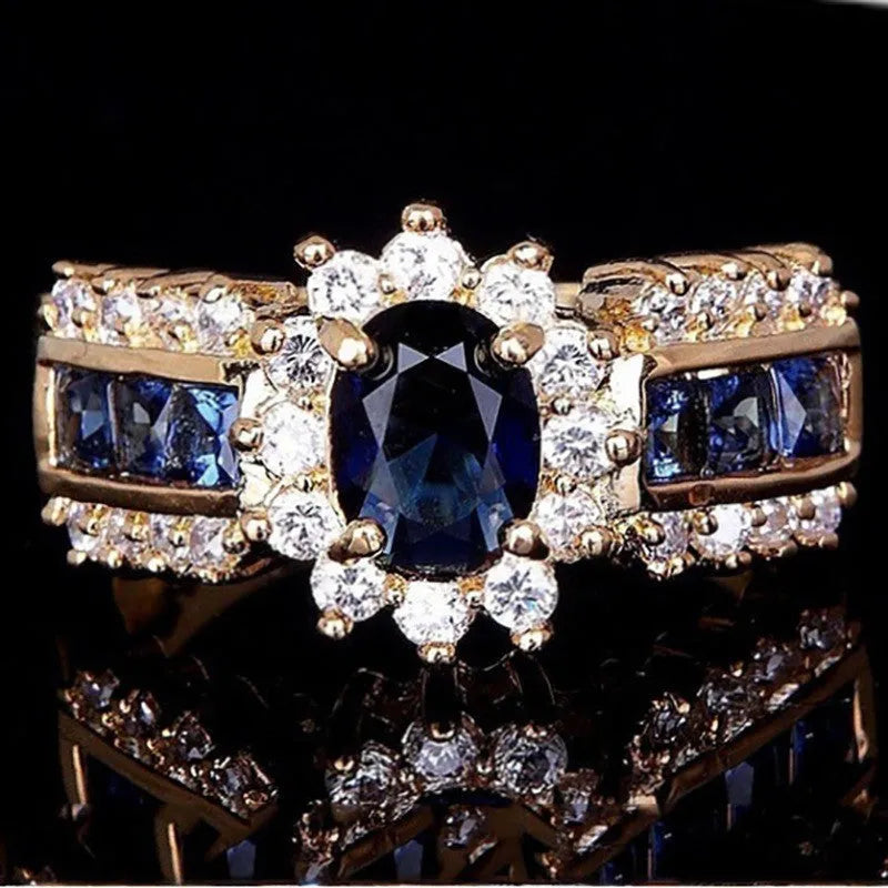 Zinc alloy ring with diamond treatment in blue and purple colour options showing unisex design