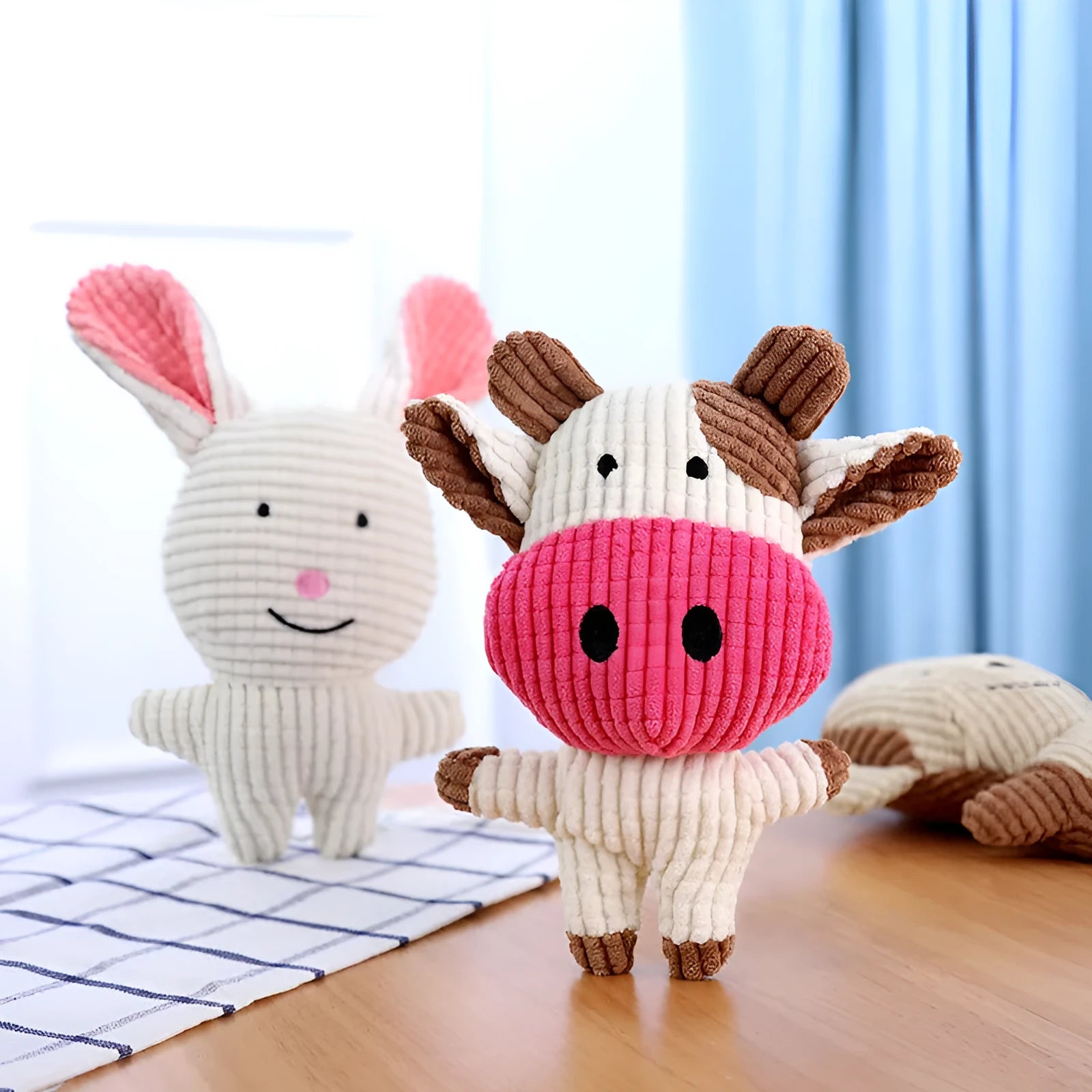 Colourful plush dog chew toy in animal shape with squeaker inside for bite-resistant chewing