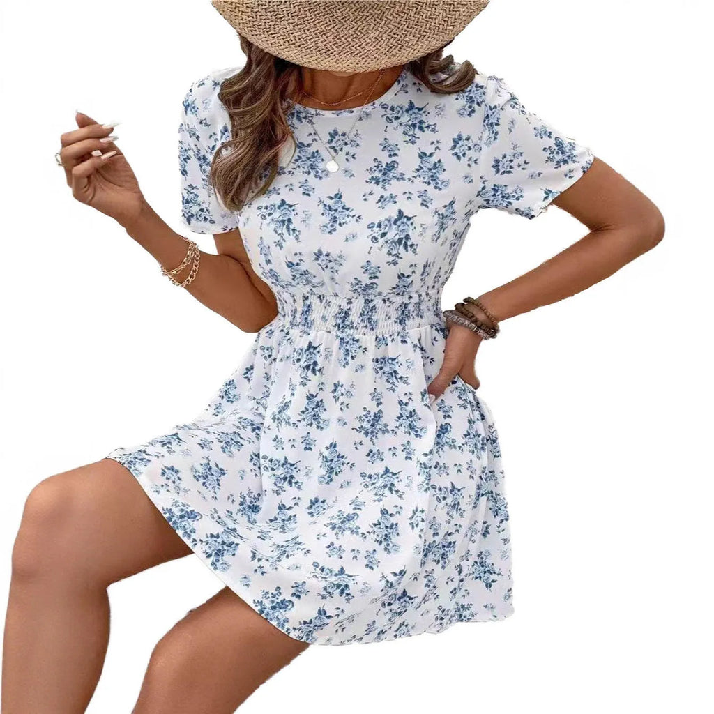 Light blue high waist A-line casual dress with short sleeves on a model.