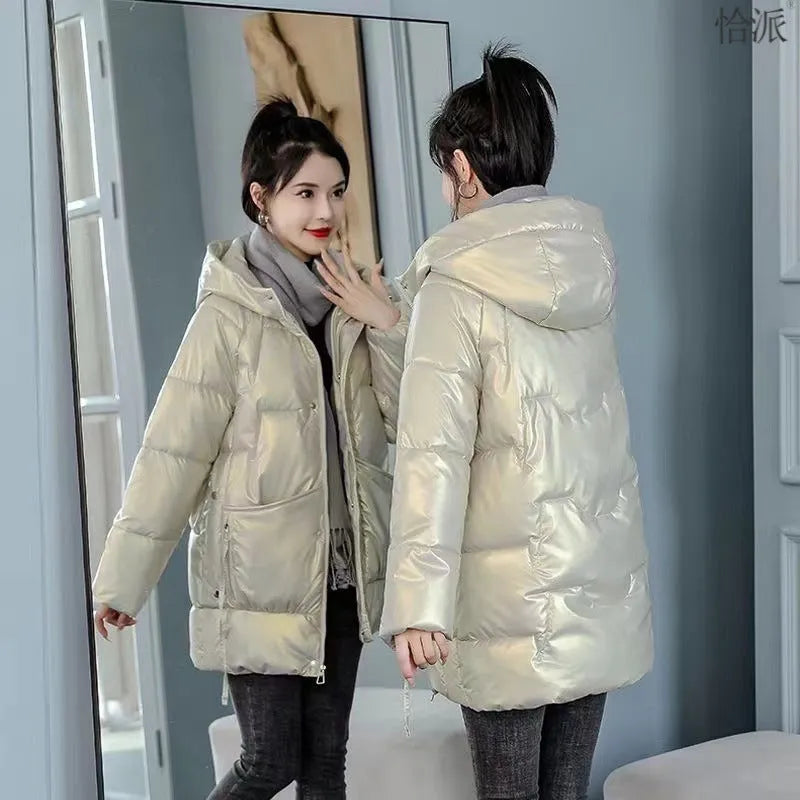 Women's loose thick hooded winter jacket in blue, showing front view with long sleeves.