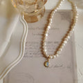 French Court vintage pearl necklace with geometric pendant on adjustable chain