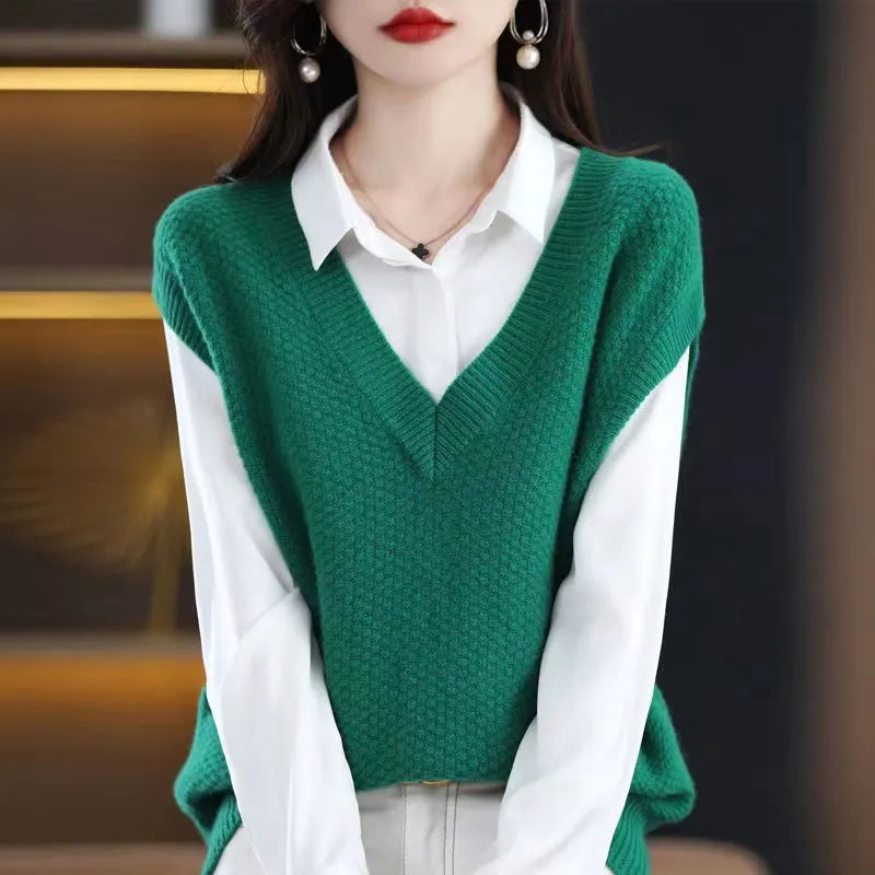 Women's creamy-white V-neck sleeveless knitted vest with a raised 3D stereoscopic pattern texture.