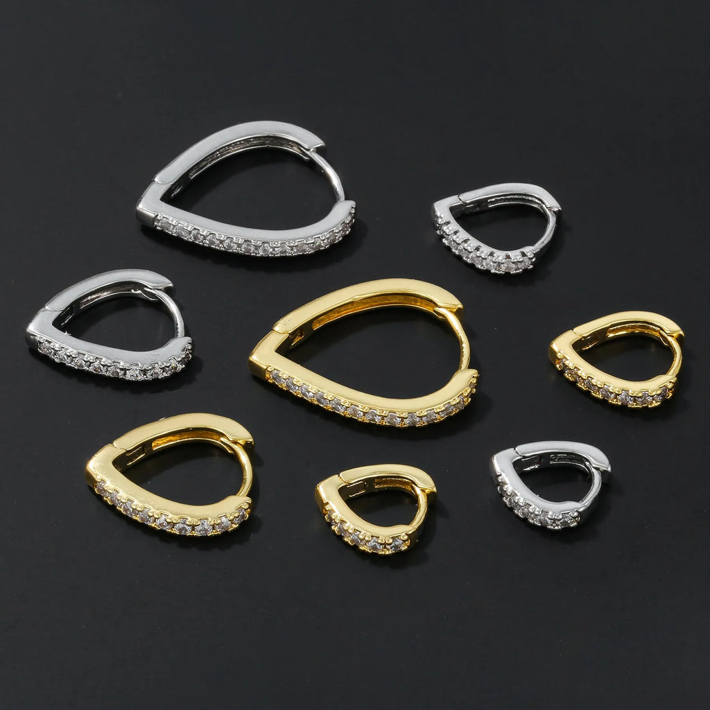 Copper ear clip with geometrical heart design in gold or white electroplated finish