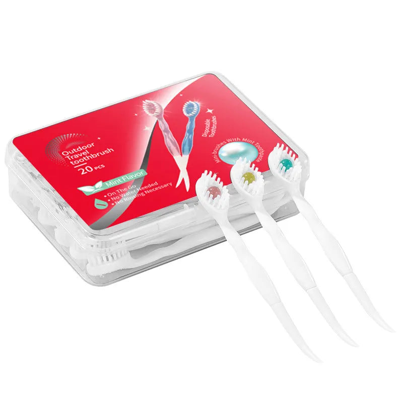 Box of disposable bead toothbrushes with integrated toothpaste beads for travel and portable oral care.