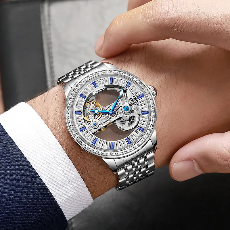 Men's waterproof mechanical watch with zircon detailing on wrist showing stainless steel butterfly buckle