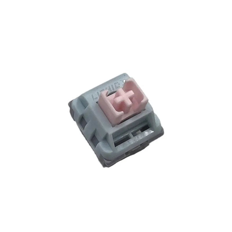 Four Dew Axis-4 linear silent mechanical keyboard switches showing stem and housing.