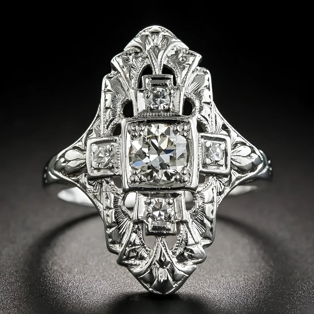 Hollow geometric silver-coloured ring with diamond-studded cubic zirconia stones, shown in profile view