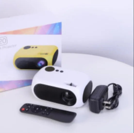 M24 micro mini projector in gold or white ABS plastic with power adapter and cables