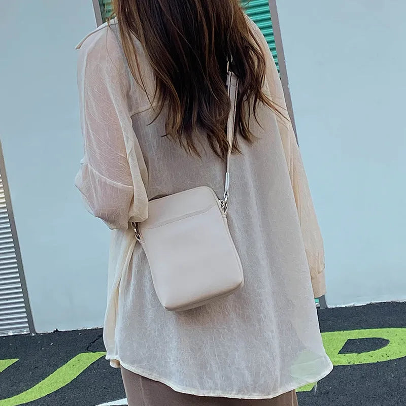 Solid colour small crossbody shoulder bag for women with adjustable strap