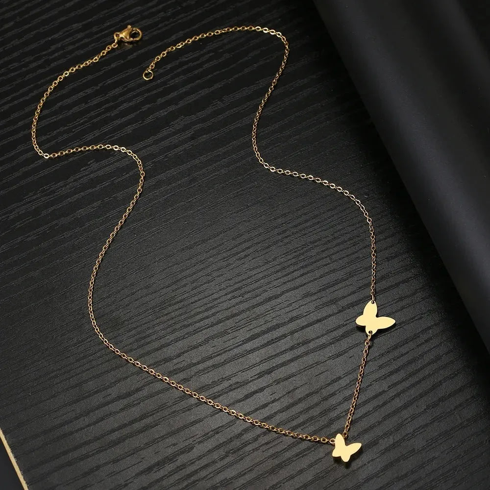 Stainless steel butterfly pendant necklace with titanium steel bow insect pendant, O-shaped chain, gold or steel colour, 18K electroplated finish.