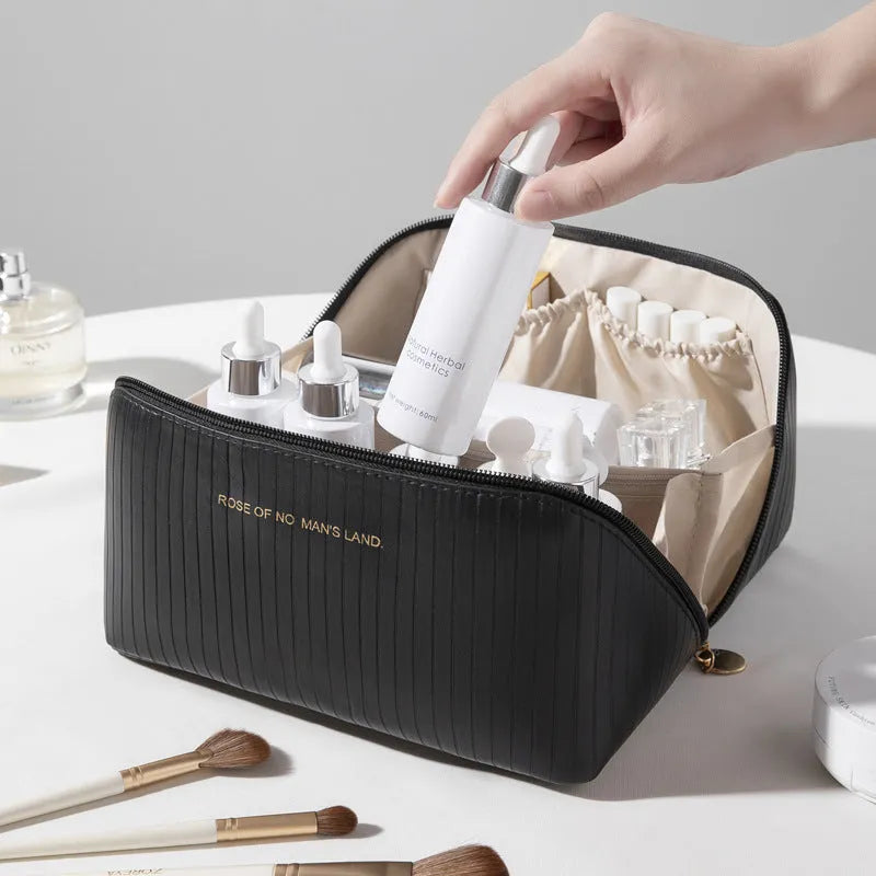 Cubic vertical pattern PU makeup bag in beige available in multiple colours for travel storage