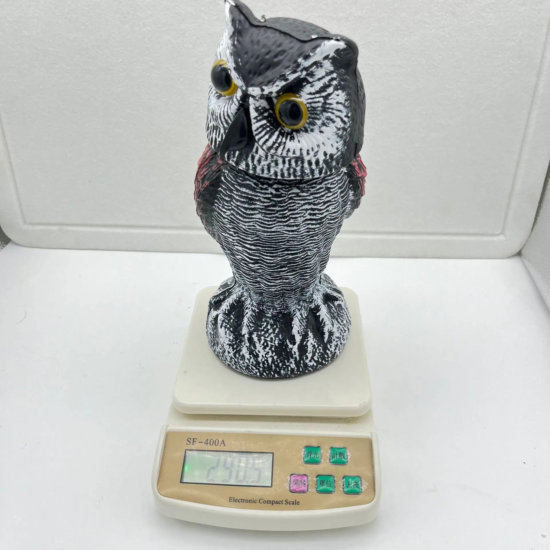 Artificial owl scarecrow bird deterrent ornament made from PE material with realistic casting details