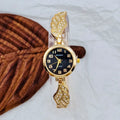 Stainless steel women's watch with round dial and Vachette clasp buckle on wrist.