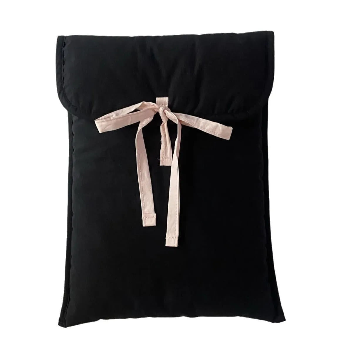 Women's black quilted laptop bag with ballet bow detail and striped pattern