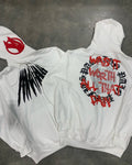 Black loose hooded sweatshirt with a white printed skull and letter design on the front.