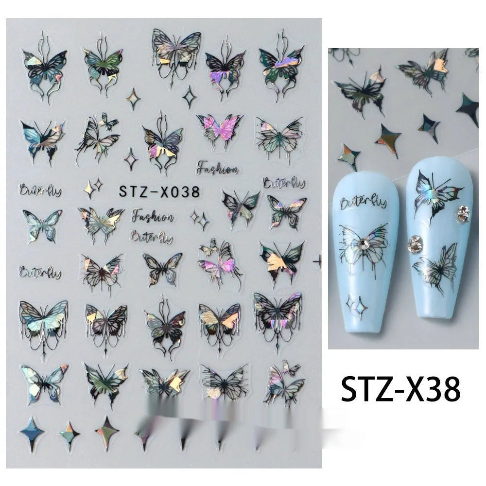 Cartoon love pattern nail art sticker decals in black and silver colours on a plastic sheet.