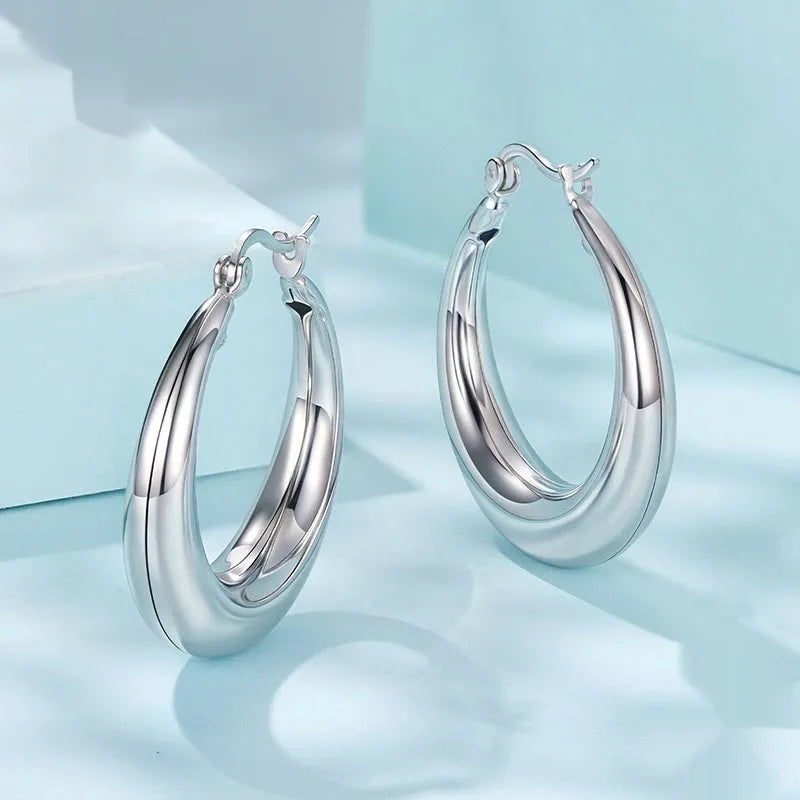 Geometric ring clip earrings with silver needle detail in electroplated copper