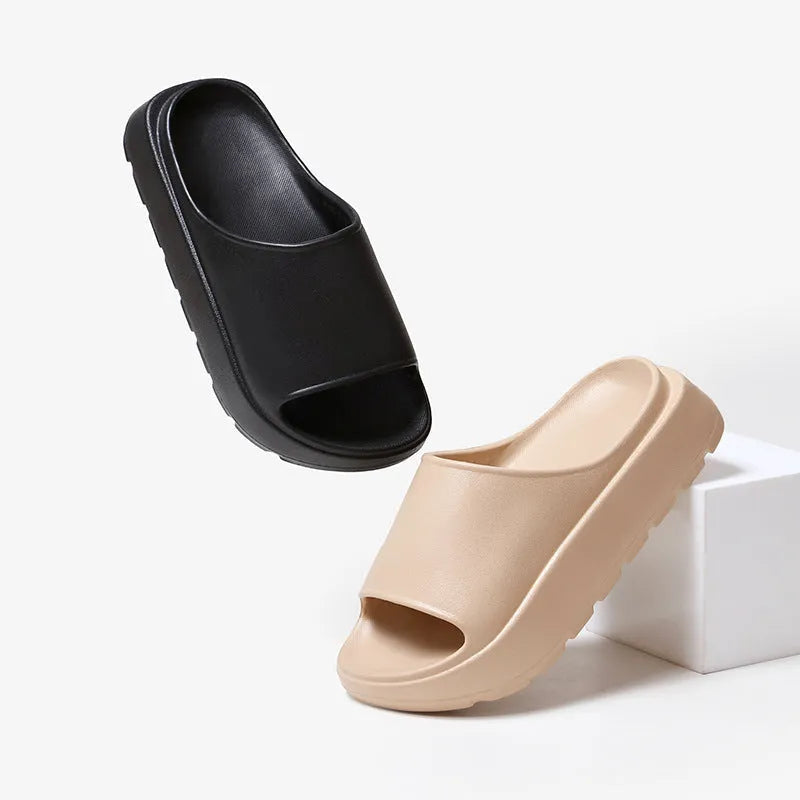Women's beige fish mouth design EVA foam slippers with a thick 5.5cm sole.