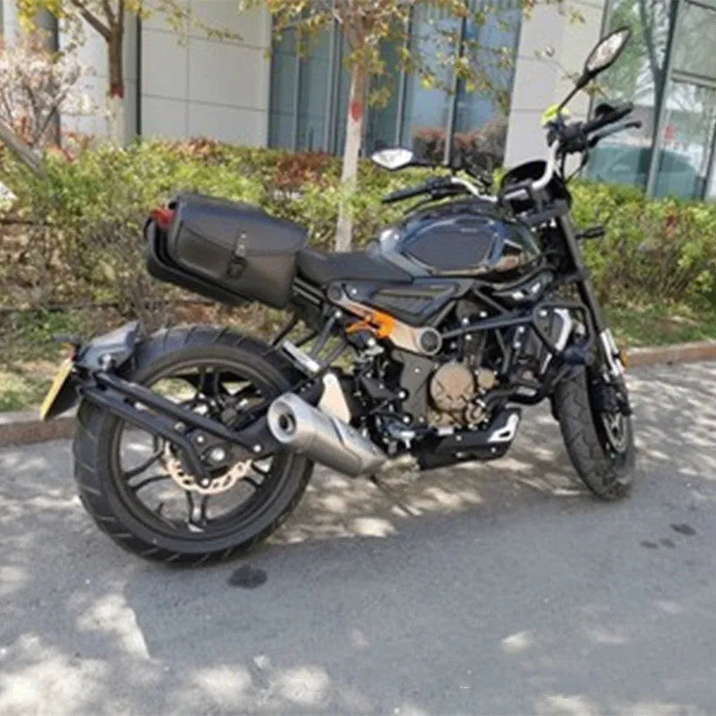 Black PU leather motorcycle swingarm saddlebag mounted on Sportster side