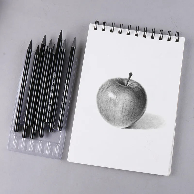 Carbonised pencil suit showing six graphite and three carbonised wooden pencils on suction card packaging