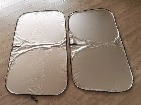 Titanium silver aluminium foil car sunshade for windscreen heat and UV protection.