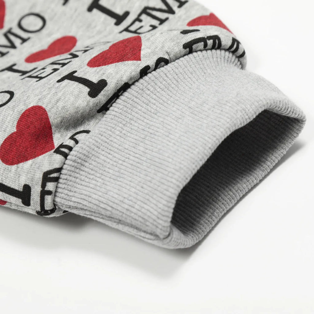 Women's mixed grey retro pattern hooded cotton cardigan sweater on a hanger.
