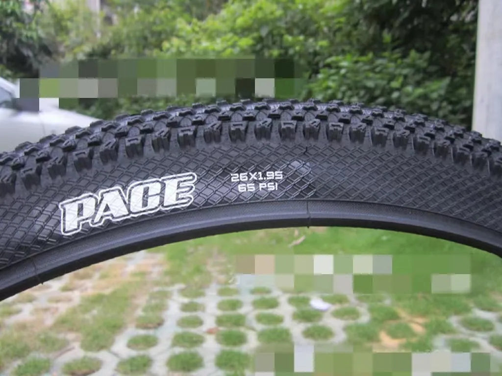 Mountain bike ultralight puncture proof tyre showing tread and white label sidewall option.
