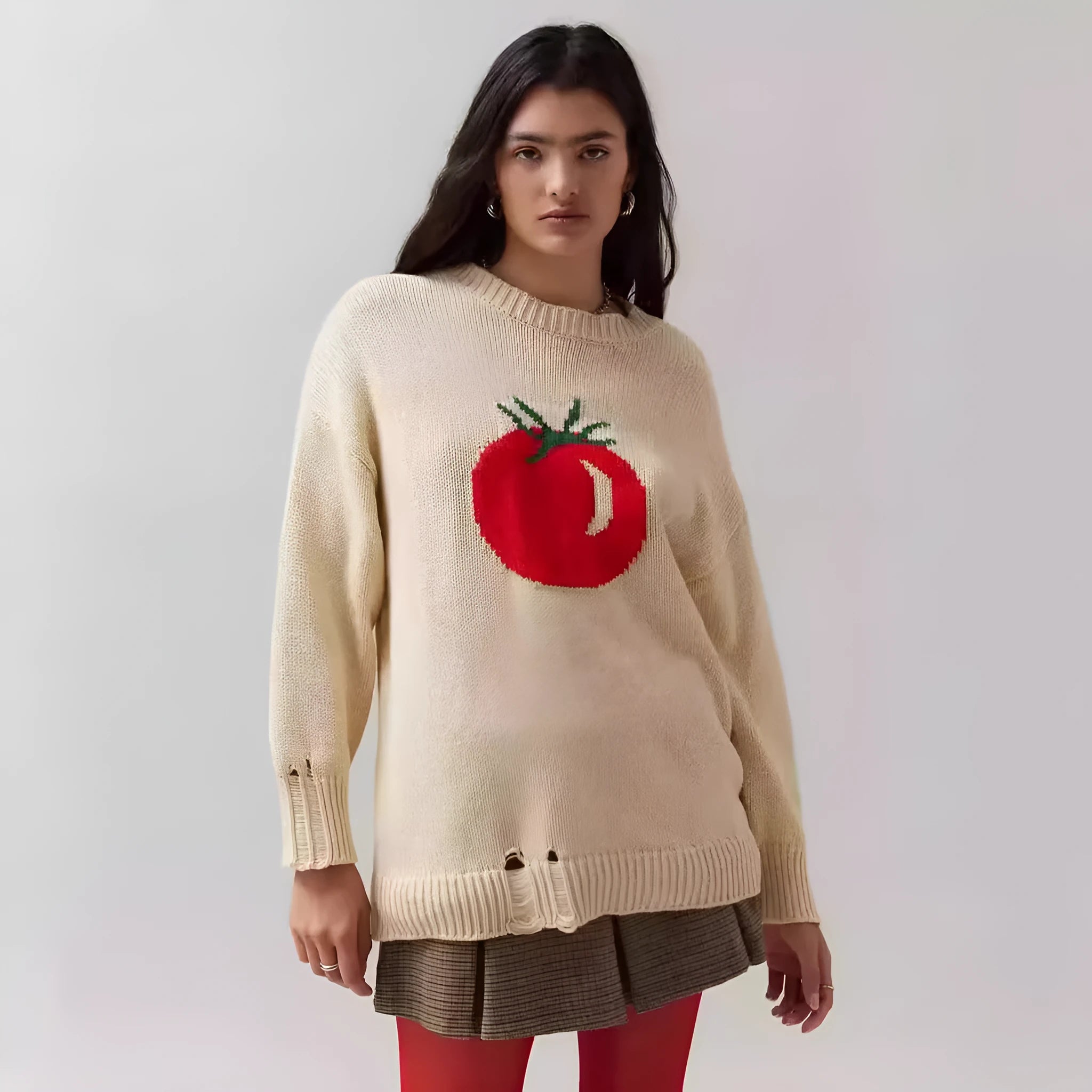 Beige women's loose-fitting acrylic sweater with a round neck and textured Jacquard knit pattern.