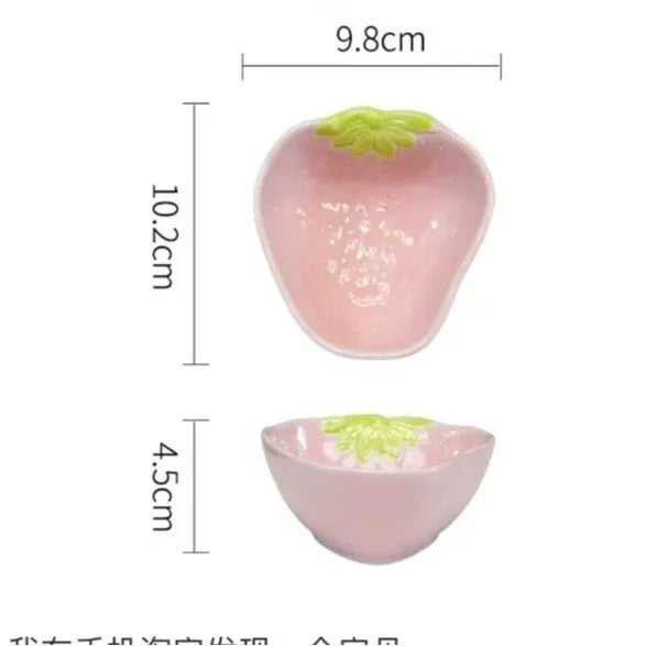 Porcelain dinnerware set with cute strawberry design showing straw hat plate, flower bowl, and twist spoon