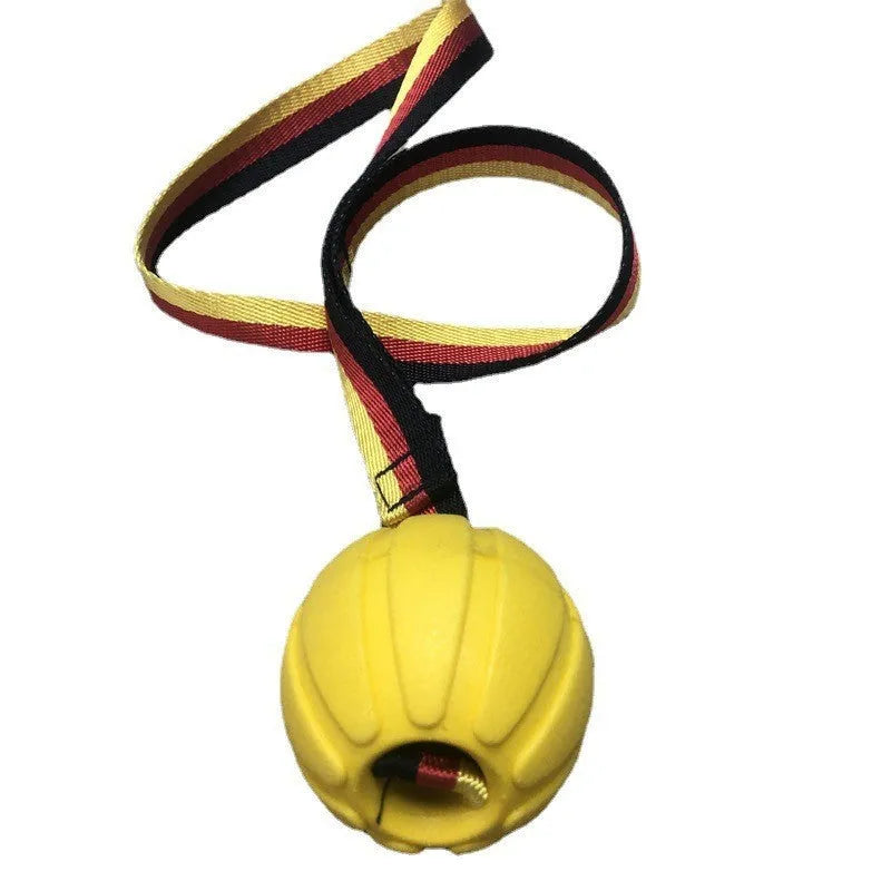 Floating EVA pet training ball with attached string in camouflage or yellow colour
