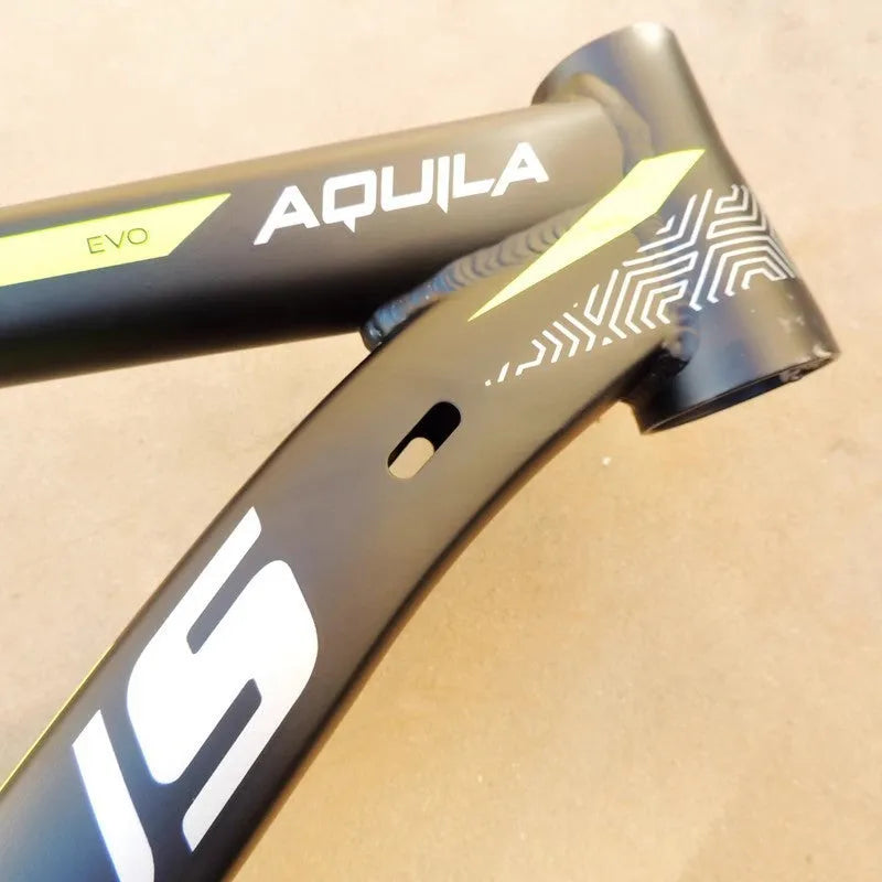Black green aluminium mountain bike frame showing disc brake mount and internal cable routing ports