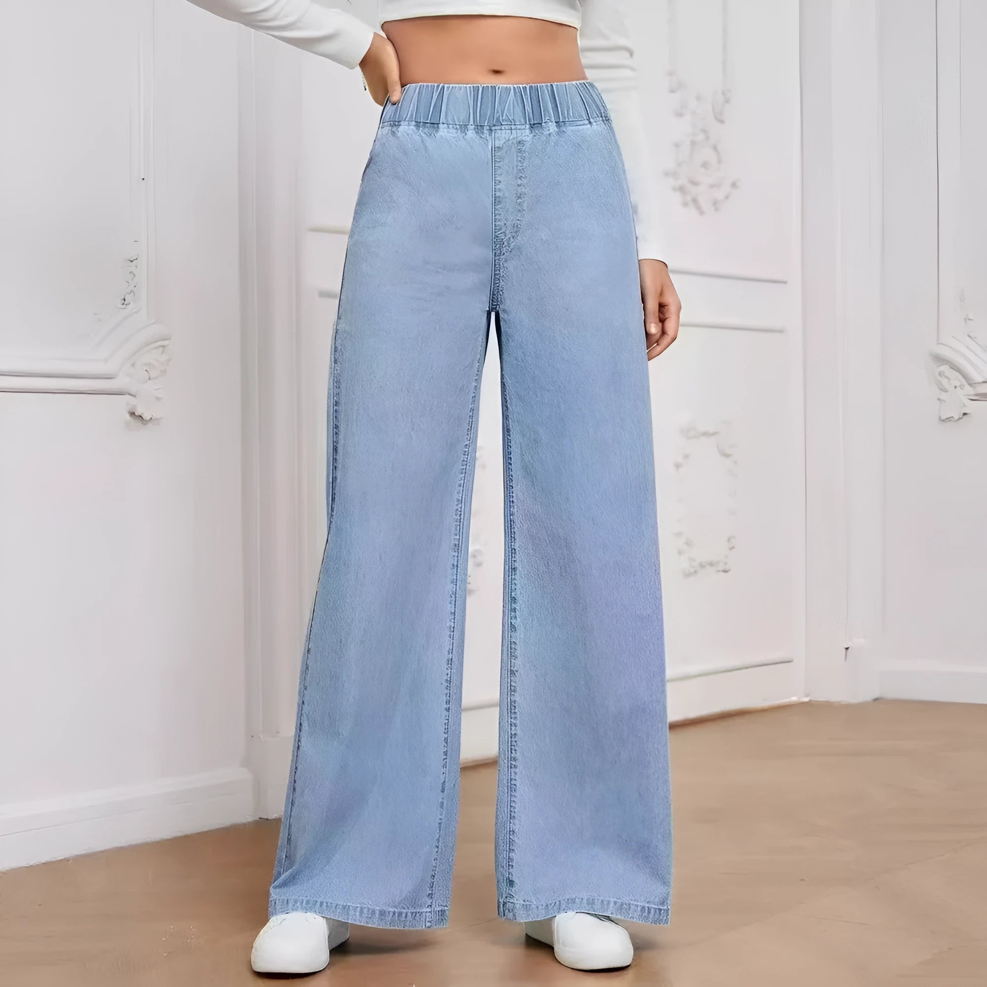 Light blue washed wide-leg women's jeans with straight trouser silhouette