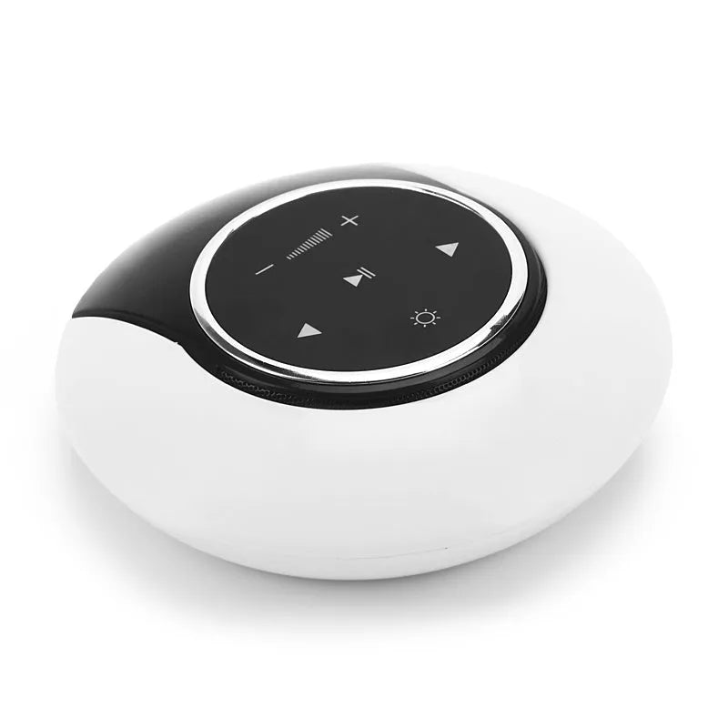 Foldable blue and white Bluetooth desk lamp with speaker, showing touch controls on a desk.