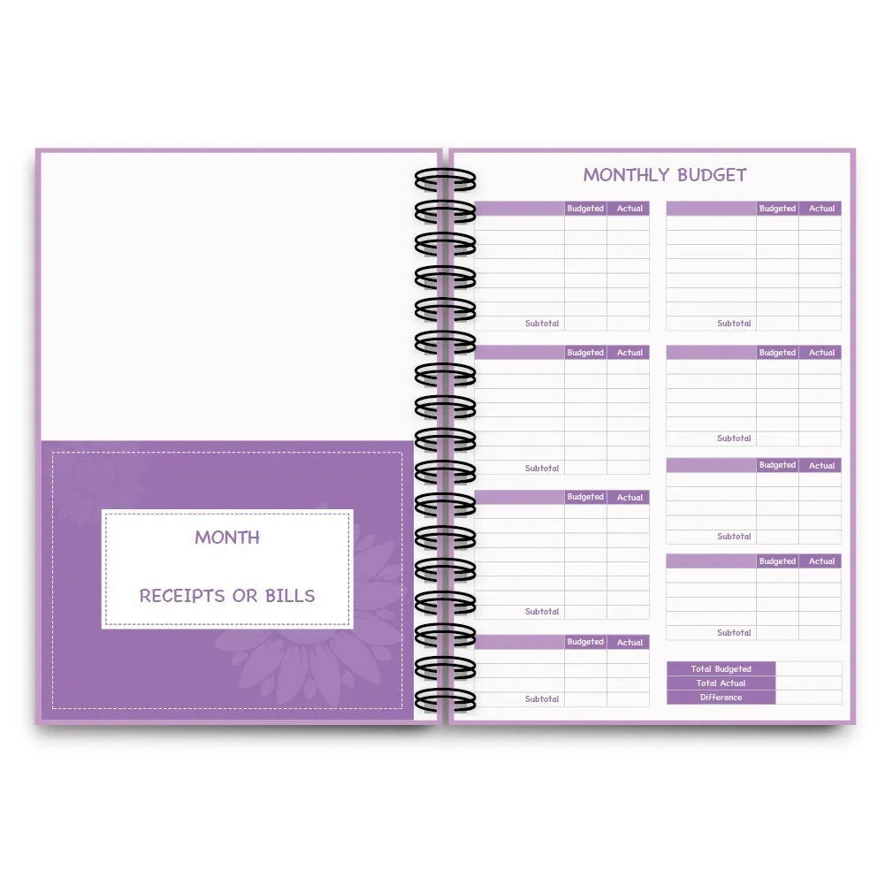 Purple coil-bound budget notebook with stickers for monthly financial planning showing Daolin paper pages