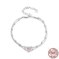 Women's 925 sterling silver bracelet with small heart-shaped pendant on an adjustable chain.