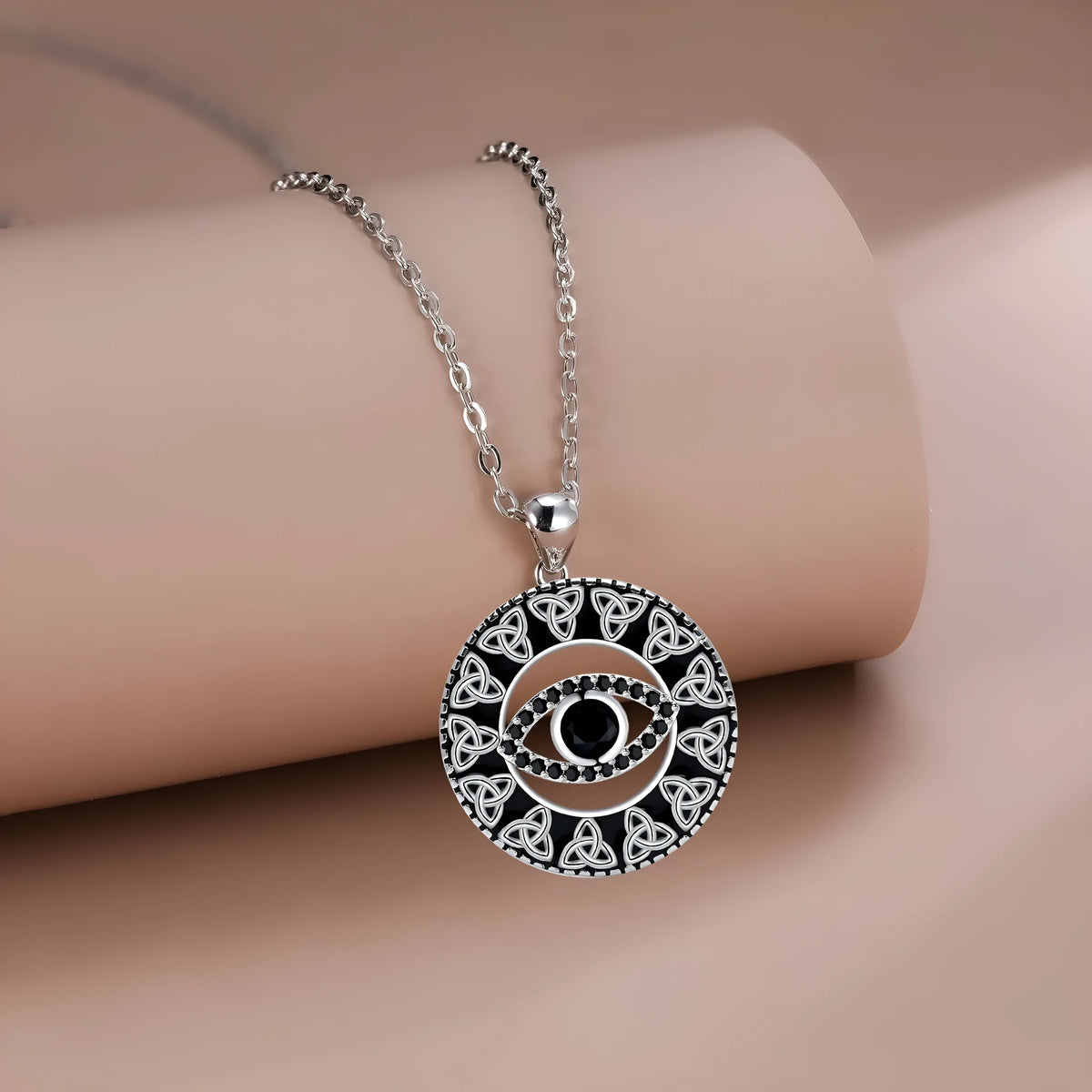 Copper Devil's Eye pendant necklace with a cross chain for women.